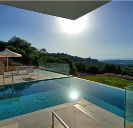 4 bedroom villa with infinity pool and sea view in Perithia, Corfu, sleeps 9
